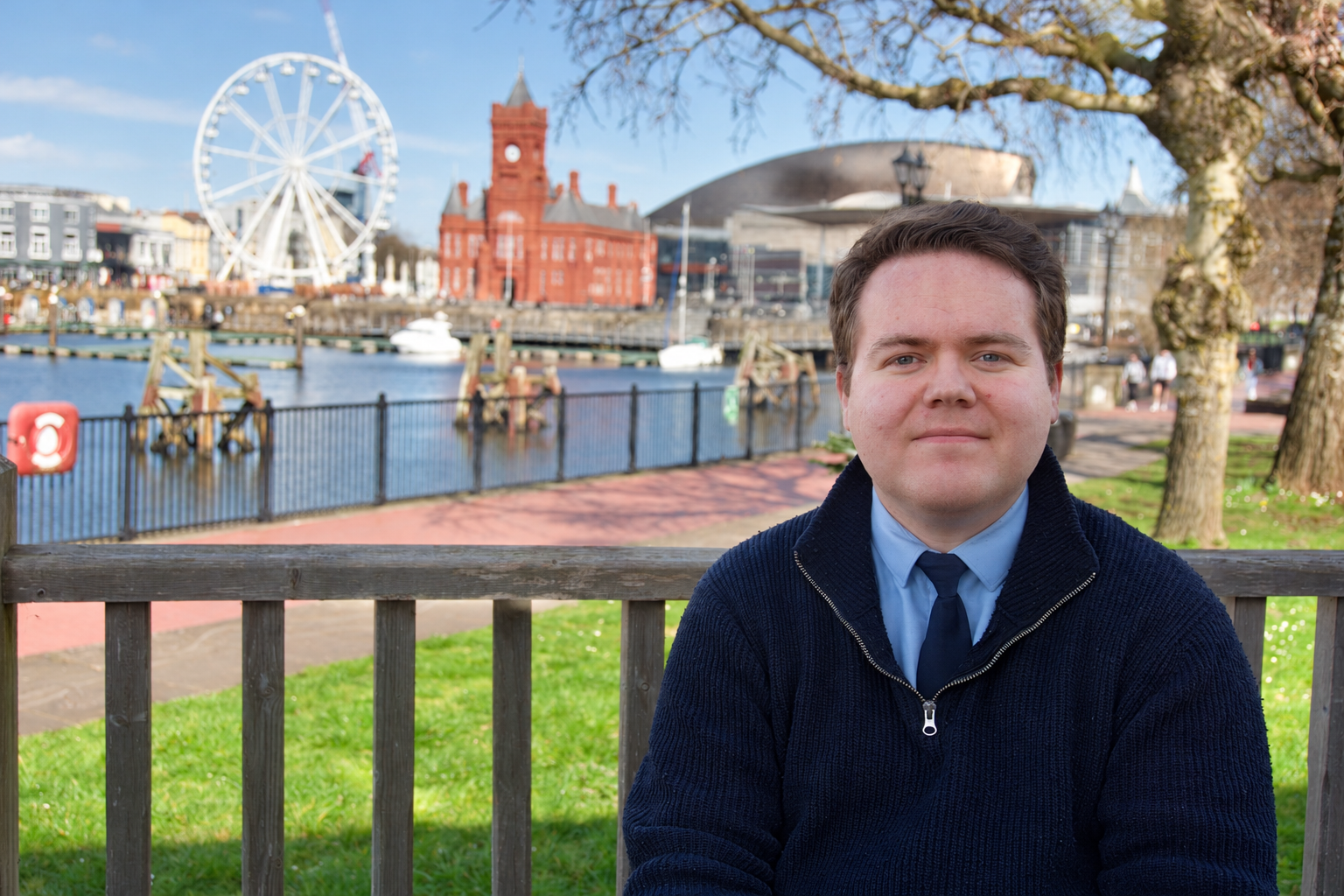 Brendan Roberts seated at Cardiff Bay